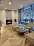301 - 15 Bruyeres Mews, Toronto, ON  - Indoor With Fireplace 