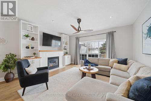 11 Lonetto Street, Whitby, ON - Indoor Photo Showing Living Room With Fireplace