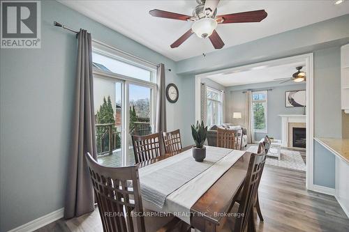 105 Oakhaven Place, Hamilton, ON - Indoor Photo Showing Dining Room With Fireplace