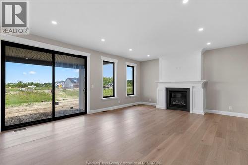 259 Joan Flood, Essex, ON - Indoor Photo Showing Living Room With Fireplace