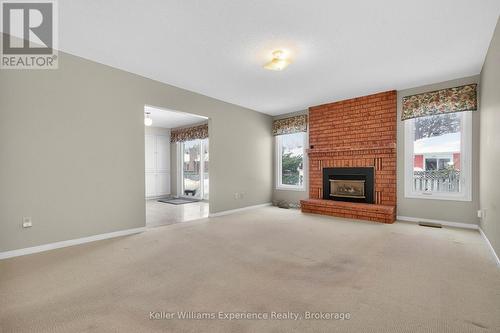 943 Playfair Road, Midland, ON - Indoor Photo Showing Living Room With Fireplace
