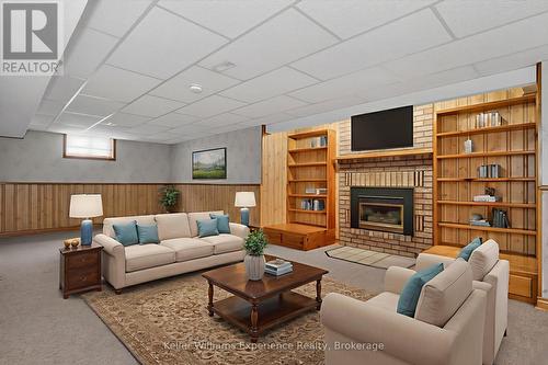 Digitally Staged - 943 Playfair Road, Midland, ON - Indoor With Fireplace