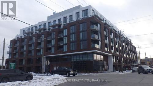 602 - 201 Brock Street S, Whitby, ON - Outdoor With Facade