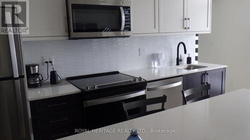602 - 201 Brock Street S, Whitby, ON - Indoor Photo Showing Kitchen With Upgraded Kitchen