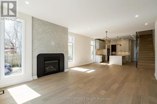 31 Commanda Way, Ottawa, ON - Indoor Photo Showing Living Room With Fireplace