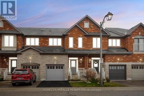 58 - 745 Farmstead Drive, Milton, ON - Outdoor With Facade