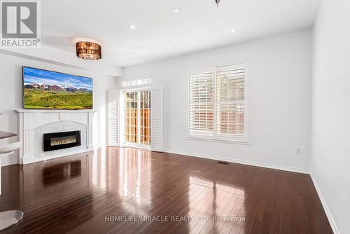 58 - 745 Farmstead Drive, Milton, ON - Indoor With Fireplace
