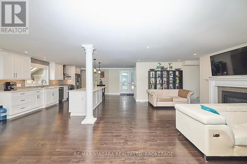 4229 Niagara River Parkway, Fort Erie (Black Creek), ON - Indoor Photo Showing Living Room With Fireplace