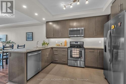 313 - 260 Villagewalk Boulevard, London North, ON - Indoor Photo Showing Kitchen With Stainless Steel Kitchen