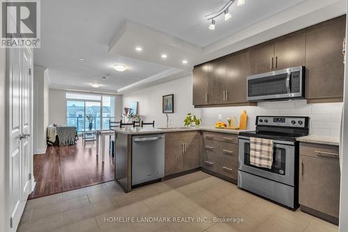 313 - 260 Villagewalk Boulevard, London North, ON - Indoor Photo Showing Kitchen With Stainless Steel Kitchen With Upgraded Kitchen