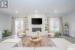 Feature wall with fireplace alongside garden doors - 