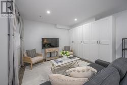 lower family room opts as guest room w/lounge - 