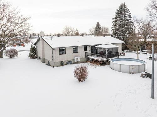 Face arrière - 225 Rue Dupont, Saint-Jean-Sur-Richelieu, QC - Outdoor With Above Ground Pool