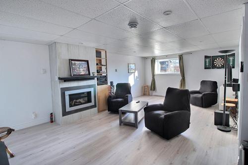 Salle à manger - 10208 Ch. De L'Éden, Rouyn-Noranda, QC - Indoor Photo Showing Living Room With Fireplace