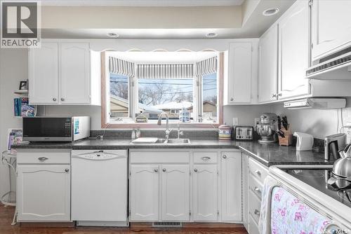 1514 8Th Avenue N, Regina, SK - Indoor Photo Showing Kitchen With Double Sink