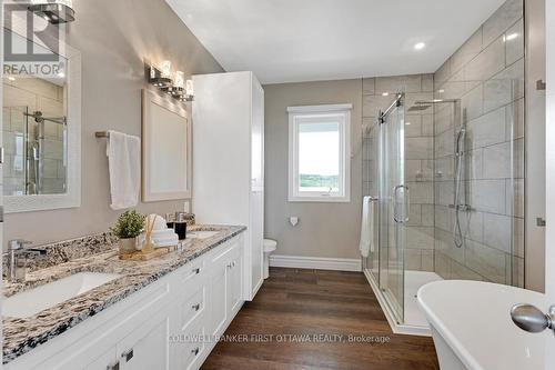 Primary suite ensuite two-sink granite vanity - 800 Waba Road, Mississippi Mills, ON - Indoor Photo Showing Bathroom