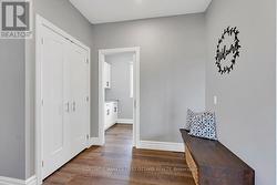 Mudroom has pocket door to laundry room - 