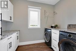 Well-equipment laundry room with window - 