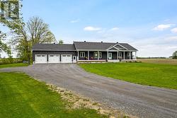 On paved township road, garbage pickup & schoolbus - 