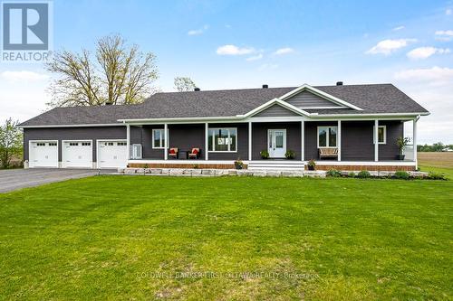 Expansive welcoming Trex verandah - 800 Waba Road, Mississippi Mills, ON - Outdoor With Deck Patio Veranda With Facade