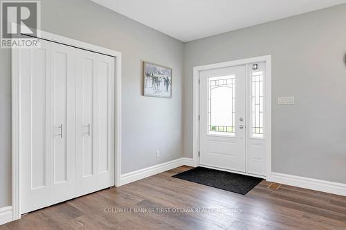 Bright white foyer with double closet - 800 Waba Road, Mississippi Mills, ON - Indoor Photo Showing Other Room