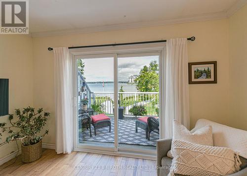 Living room walkout to lakeside deck - 204 - 43 Creighton Street, Ramara, ON - Indoor