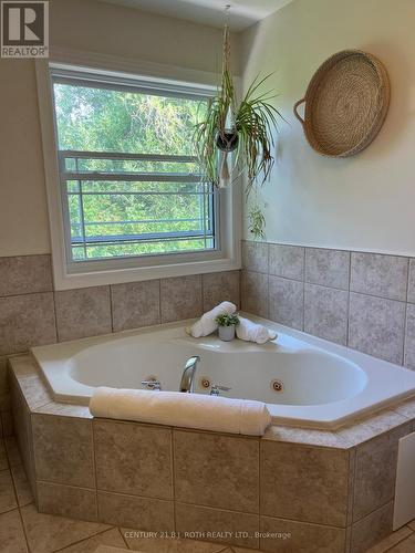 Primary ensuite with jetted tub - 204 - 43 Creighton Street, Ramara, ON - Indoor Photo Showing Bathroom