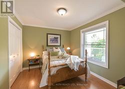 Second bedroom overlooking front porch - 
