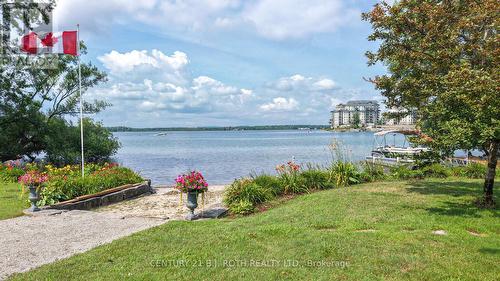 Private sandy beach, gentle shallow entry - 204 - 43 Creighton Street, Ramara, ON - Outdoor With Body Of Water With View
