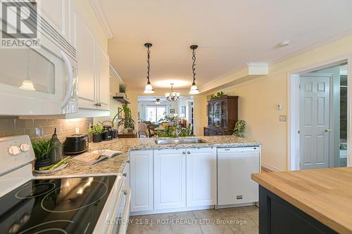 Open concept kitchen dining great for gatherings - 204 - 43 Creighton Street, Ramara, ON - Indoor Photo Showing Kitchen