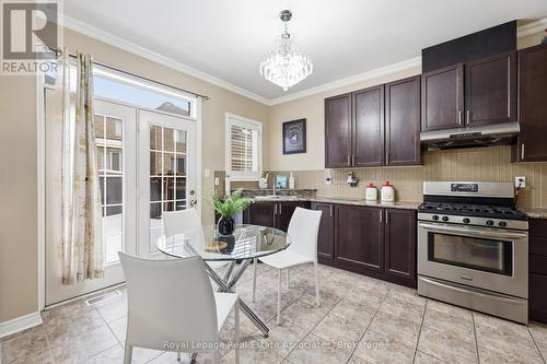 Modern kitchen with Gas stove and folding doors - 26 Prebble Drive, Markham, ON - Indoor