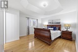 Master bedroom with coffered ceilings & w/i closet - 