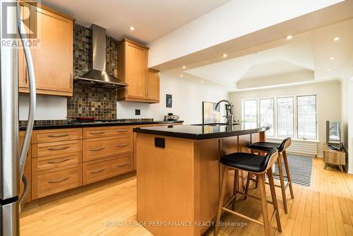 Updated kitchen with eat-up bar - 241 Fourth Avenue, Ottawa, ON - Indoor Photo Showing Kitchen With Upgraded Kitchen