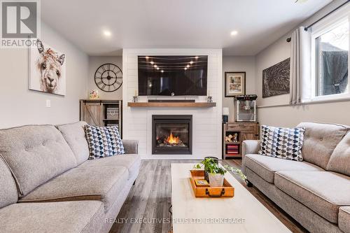 Gas fireplace to keep you cozy - 363 Emerick Avenue, Fort Erie (Central), ON - Indoor Photo Showing Living Room With Fireplace