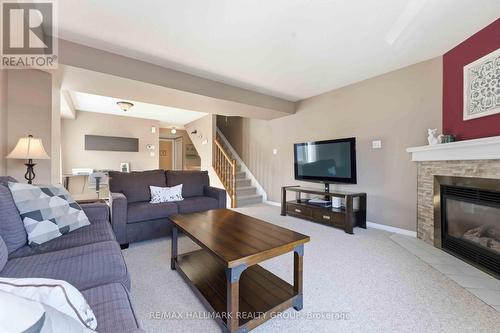 21 - 1660 Locksley Lane, Ottawa, ON - Indoor Photo Showing Living Room With Fireplace