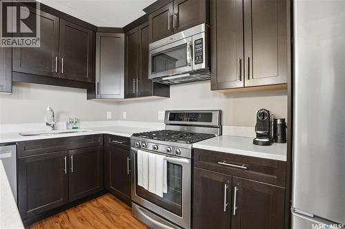 234 Maningas Bend, Saskatoon, SK - Indoor Photo Showing Kitchen With Upgraded Kitchen