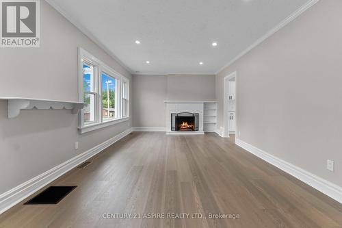 332 Alfred Street, Pembroke, ON - Indoor Photo Showing Living Room With Fireplace