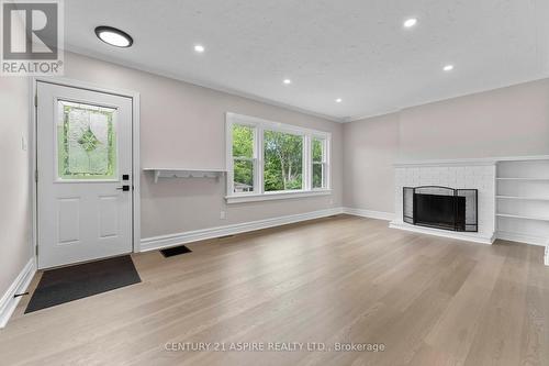 332 Alfred Street, Pembroke, ON - Indoor Photo Showing Living Room With Fireplace