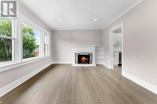 332 Alfred Street, Pembroke, ON - Indoor Photo Showing Living Room With Fireplace