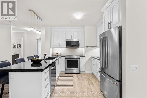 616 - 830 Megson Terrace, Milton, ON - Indoor Photo Showing Kitchen With Double Sink With Upgraded Kitchen