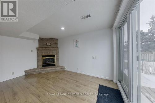 233 Benesfort Crescent, Waterloo, ON - Indoor With Fireplace
