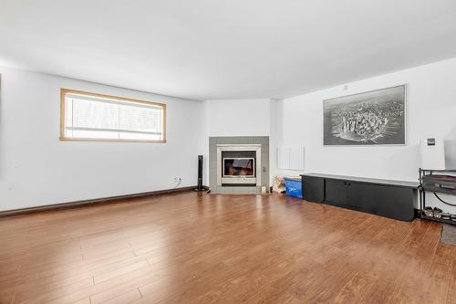 Salle familiale - 3171 Rue Dupuis, Sainte-Julienne, QC - Indoor Photo Showing Living Room With Fireplace
