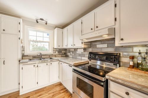 Cuisine - 412 Boul. St-Joseph, Sainte-Julie, QC - Indoor Photo Showing Kitchen With Double Sink