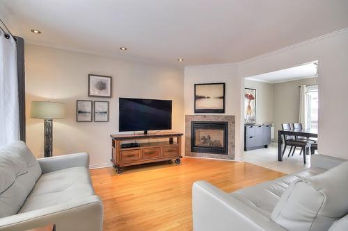 Salon - 20 Rue Joseph-Bepka, Blainville, QC - Indoor Photo Showing Living Room With Fireplace