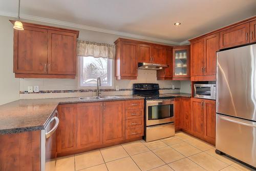 Cuisine - 20 Rue Joseph-Bepka, Blainville, QC - Indoor Photo Showing Kitchen With Double Sink