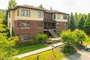 Frontage - 202-131 Rue De Laviolette, Bromont, QC  - Outdoor 