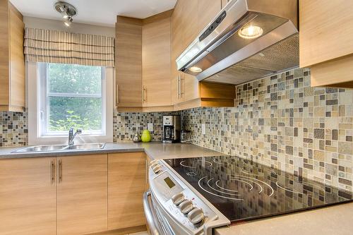 Kitchen - 202-131 Rue De Laviolette, Bromont, QC - Indoor Photo Showing Kitchen With Double Sink