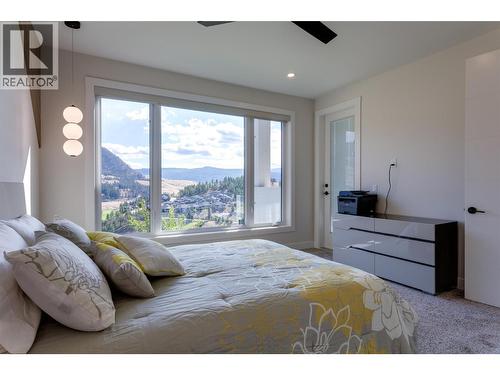 703 Carnoustie Drive, Kelowna, BC - Indoor Photo Showing Bedroom