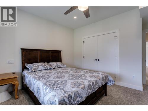 703 Carnoustie Drive, Kelowna, BC - Indoor Photo Showing Bedroom