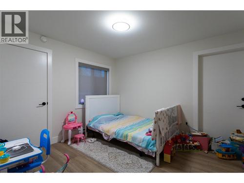 703 Carnoustie Drive, Kelowna, BC - Indoor Photo Showing Bedroom